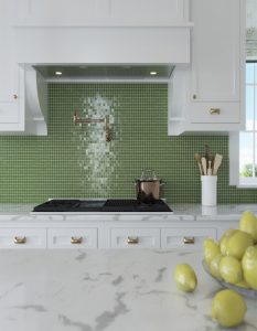 white cabinets and green tiles in kitchen
