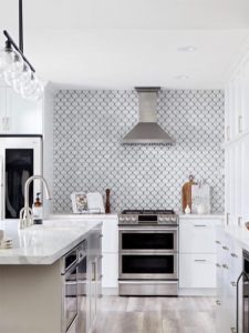 Carrara hexagon backsplash tiles in kitchen