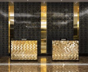 gold tiles in hotel lobby reception